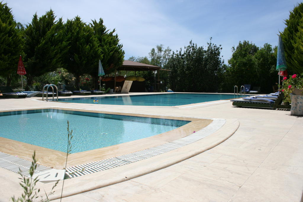 Paradise Garden Gumusluk Evleri Aparthotel Exterior photo