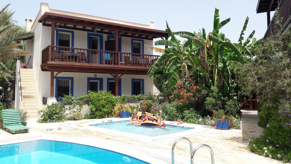 Paradise Garden Gumusluk Evleri Aparthotel Exterior photo