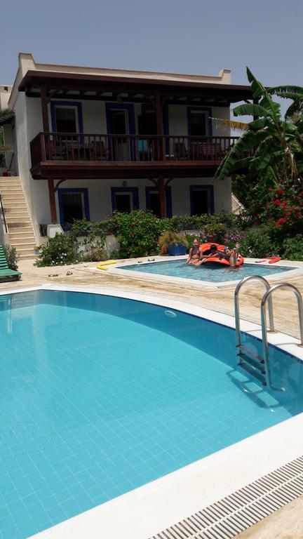 Paradise Garden Gumusluk Evleri Aparthotel Exterior photo