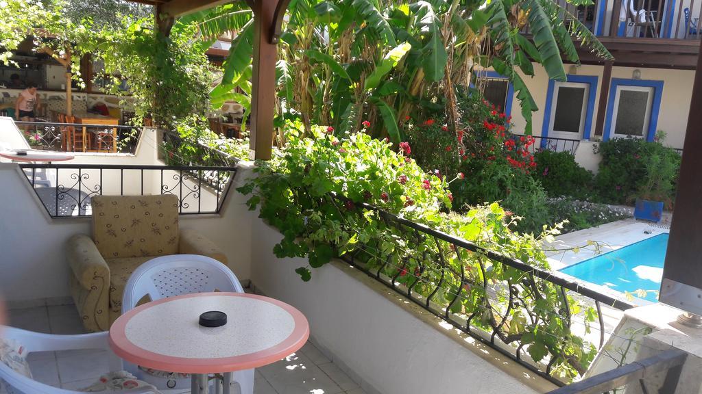 Paradise Garden Gumusluk Evleri Aparthotel Room photo